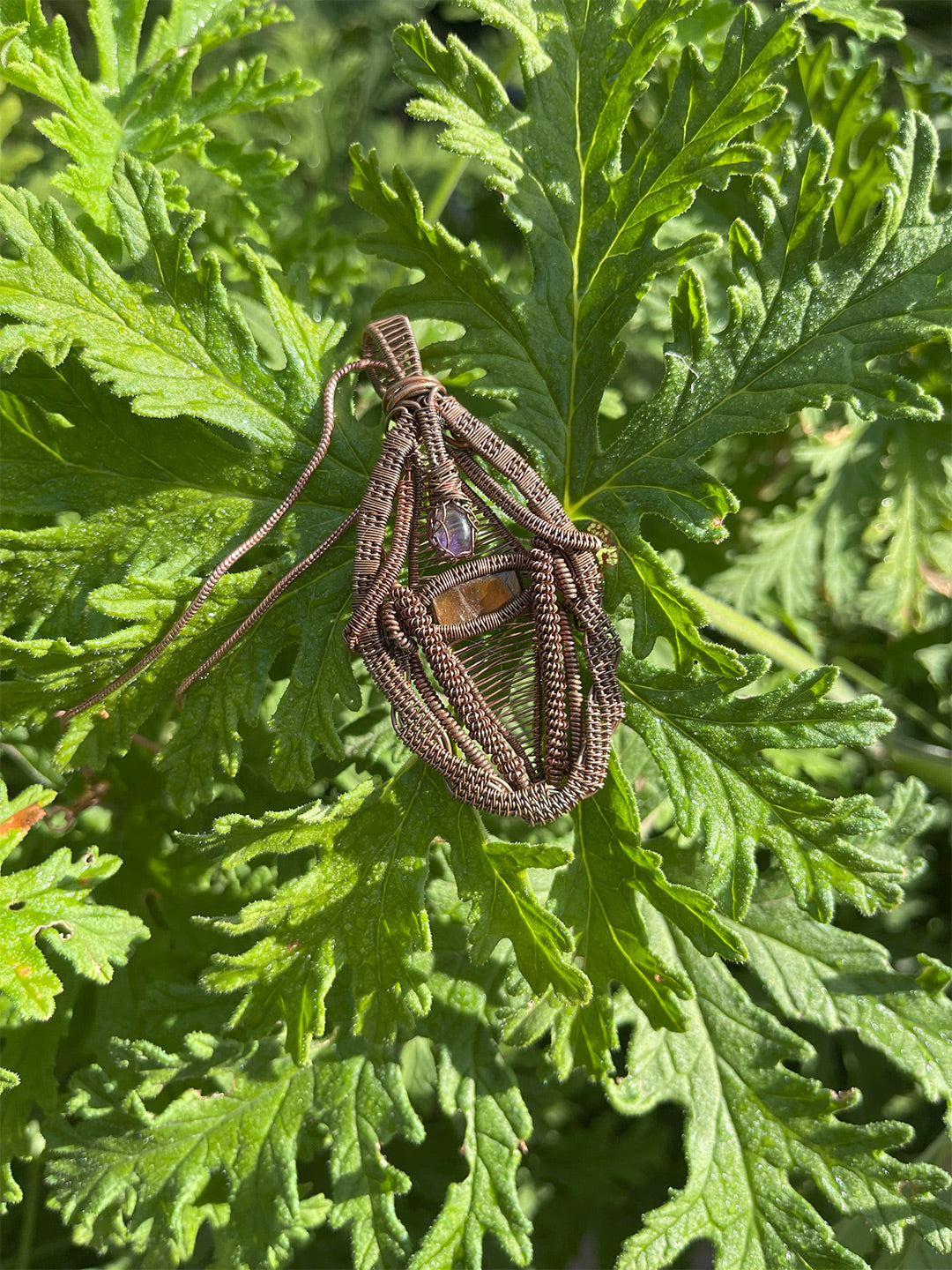 ammolite and amethyst pendant straight on photo