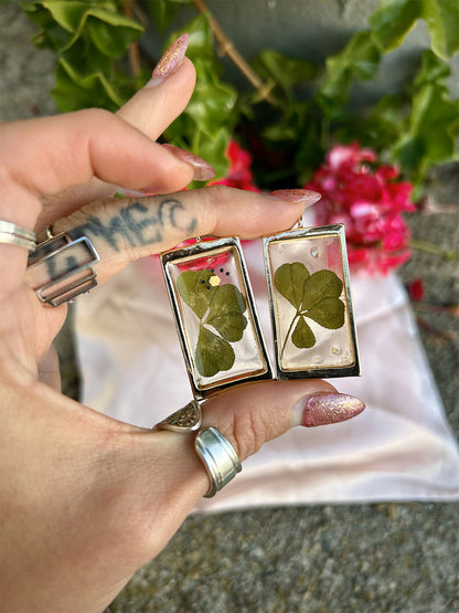 Rectangular clover resin earrings close up