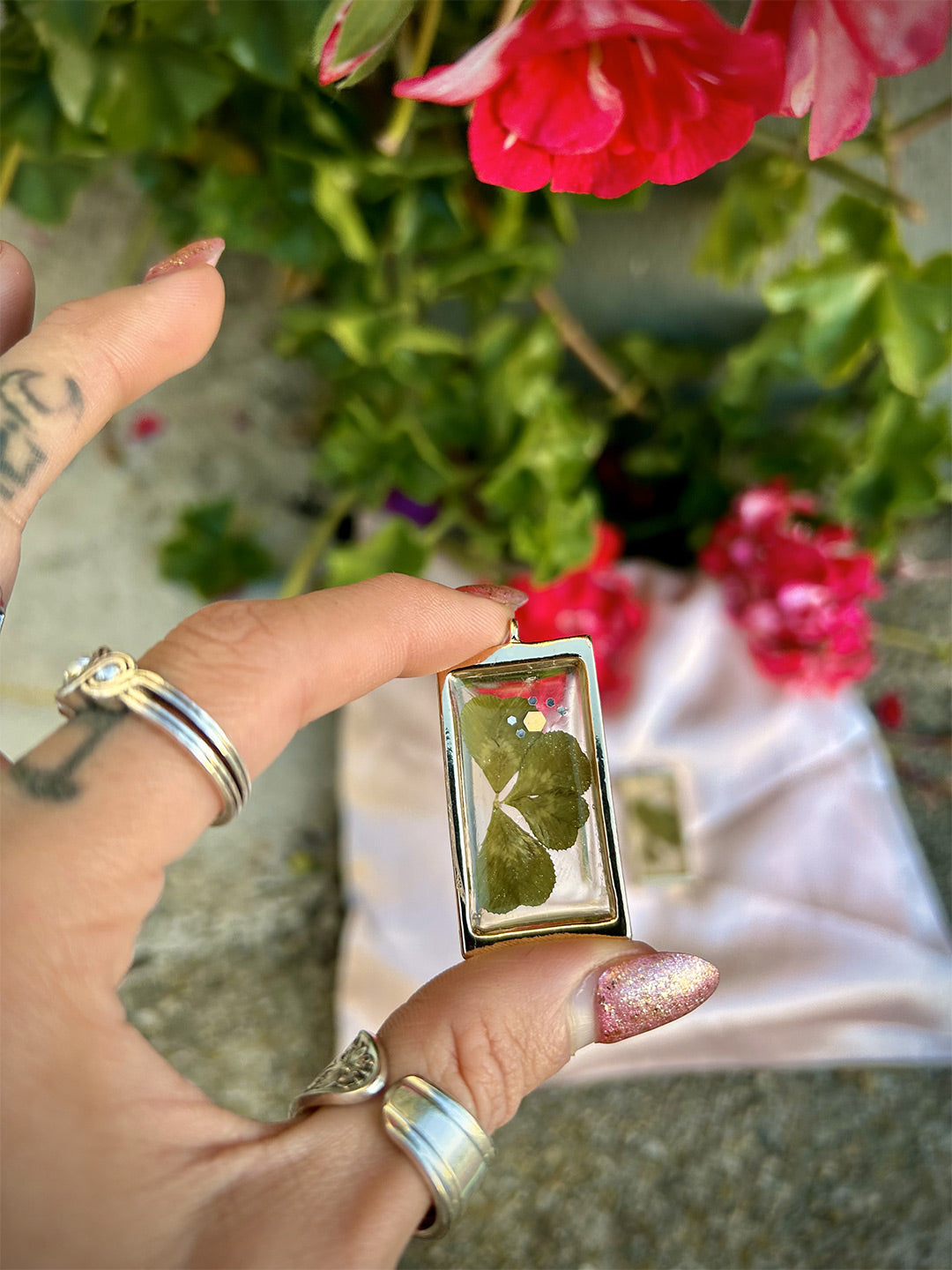 Rectangular clover resin earrings single close up