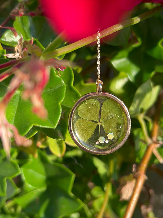 Clover Necklace front close up in the sun